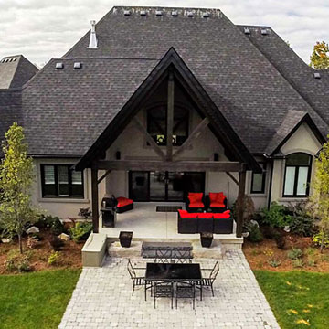 Exterior of the back of a home with large patio