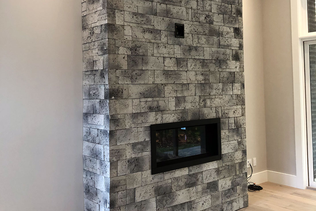 Staffordshire fireplace with stone surround.